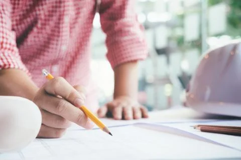 Engineer meeting for architectural project working with partner. Stock Photos