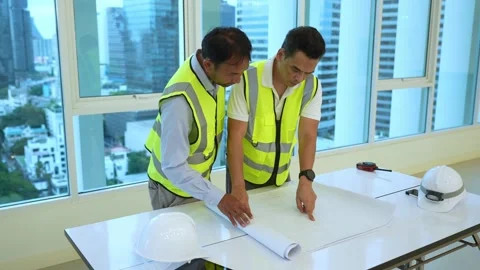 Engineer men discuss working in building Stock Footage 280732504