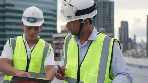 Engineer men discuss working in building Stock Footage 280732529
