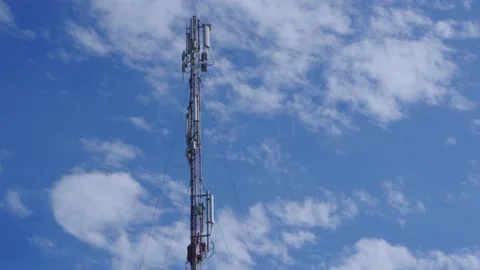 An engineer of a mobile company serves a mobile transmission station. Stock Footage 131658908