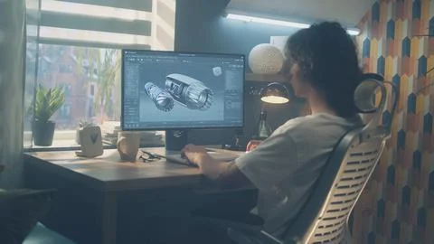 Engineer modeling 3D turbine on computer Stockfoto's