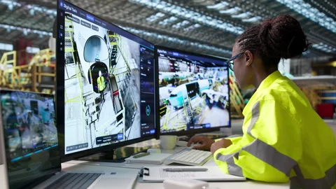 Engineer Monitors Real-time 3D Twin Simulation Stock Footage 344718999