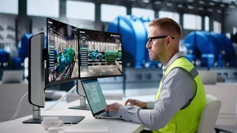 Engineer Monitors Real-time 3D Simulation On Laptop Stock Footage 346923075