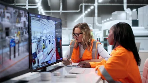 Engineer Monitors Real-time SCADA System Stock Footage 346320278