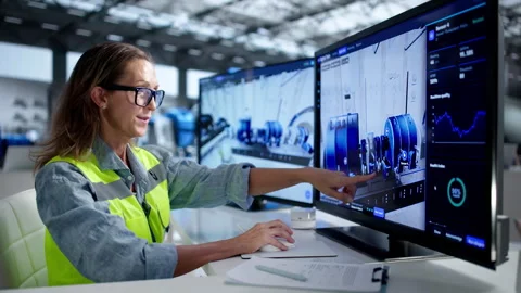 Engineer Monitors Real-time SCADA Software Stock Footage 346324307