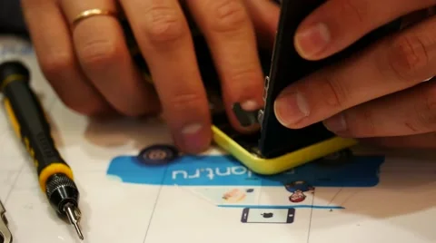 Engineer mount new display on smartphone, during cellphone repair 스톡 동영상 60628708