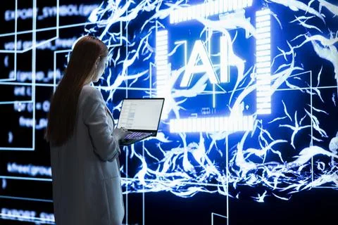 Engineer observing rapid AI development and automated code generation Stock Photos