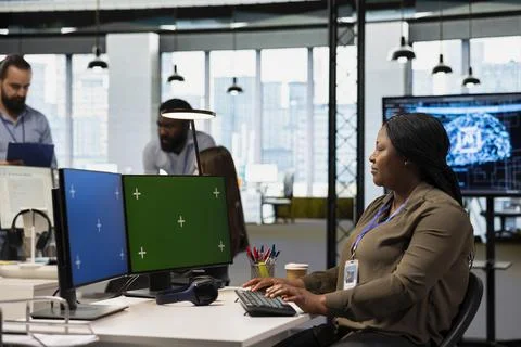 Engineer in office using AI on isolated screen computer to do app development Stock Photos