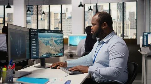 Engineer in office works on power lines pole CAD design for improved technology Stock Photos