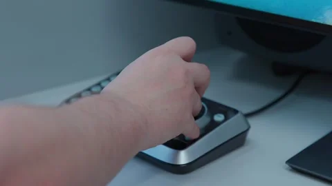 An engineer operates a control panel during broadcast, right angle Video stock 276925288