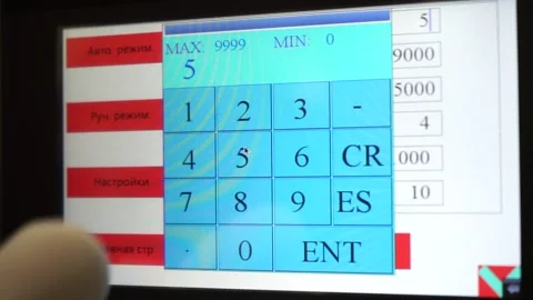 Engineer operating large CNC machine used for milling and steel work production Stock Footage 156838106