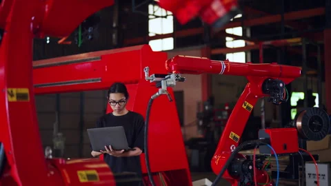 Engineer Operating Robotic Arm in Factory. Stock Footage 280554018