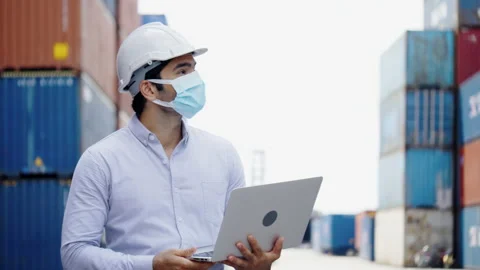 Engineer or construction use laptop for factory work. video conference Stock Footage 138311987