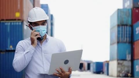 Engineer or construction use laptop for factory work. video conference Stock Footage 138312159