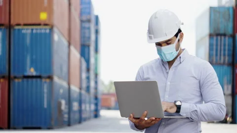 Engineer or construction use laptop for factory work. video conference Stock Footage 138312305