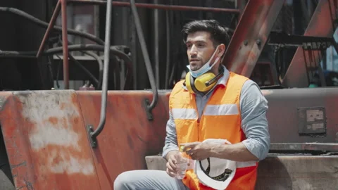Engineer or construction worker Drink clean water and wear safety equipment Stock Footage 139522025
