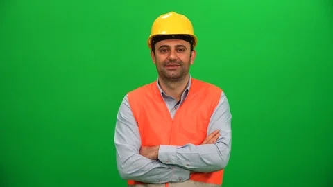 Engineer or Construction Worker Looking on Green Background Stock Footage 88652557