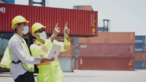 Engineer or construction worker wearing a hard hat and Face mask While working 스톡 동영상 138885573