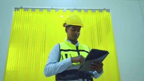 Engineer or factory worker using tablet computer. Stock Footage 242819389