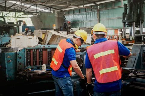 Engineer or mechanical worker with yellow safety helmet. Stock Photos