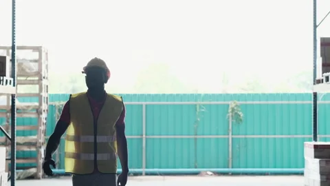 Engineer or technical walk in the warehouse Stock Footage 143149945