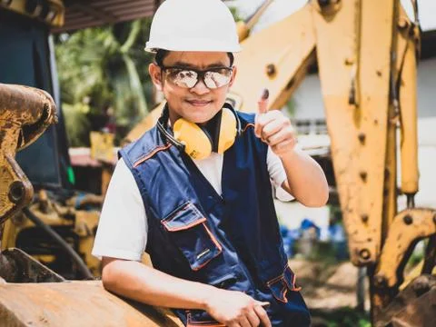 Engineer or Technician in heavy construction site. the professional mechanica Stock Photos