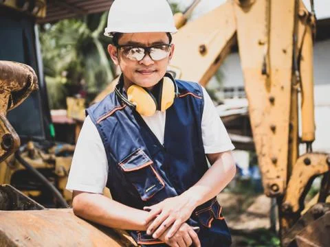 Engineer or Technician in heavy construction site. the professional mechanica Stock Photos