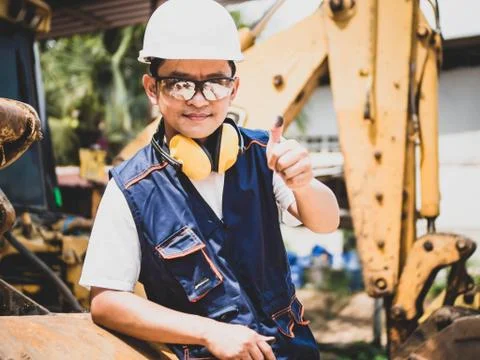 Engineer or Technician in heavy construction site. the professional mechanica Stock Photos