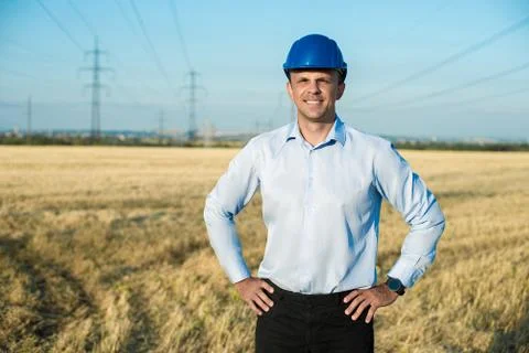 Engineer or worker smiles in protective helmet Stock-Fotos