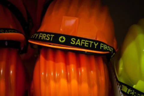 Engineer or Worker Yellow Safety Helmet Hat with SAFETY FIRST word Stock Photos