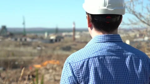 Engineer oversees the construction site Stock Footage 152755794