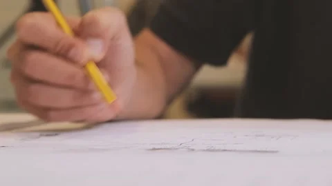 Engineer paints with hand Stock Footage 145093941