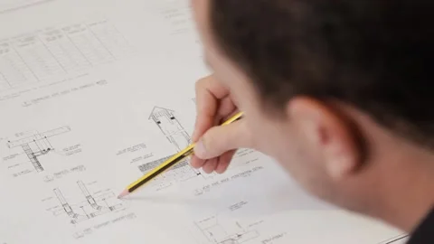 Engineer paints with hand Stock Footage 145094194
