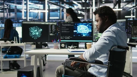 Engineer with paraplegia in data center annoyed by slow AI node tree software Stock Footage 307040327