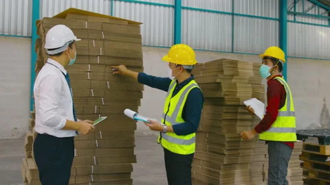 Engineer people are wearing  protective mask working in warehouse Vídeo Stock 158174059