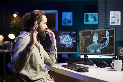 Engineer perplexed by sentient AI gaining humanoid form, reluctantly waving hand Foto stock