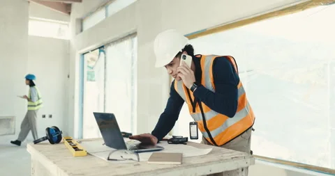 Engineer, phone call and man with laptop at construction site, coordination or Stock Footage 344921904