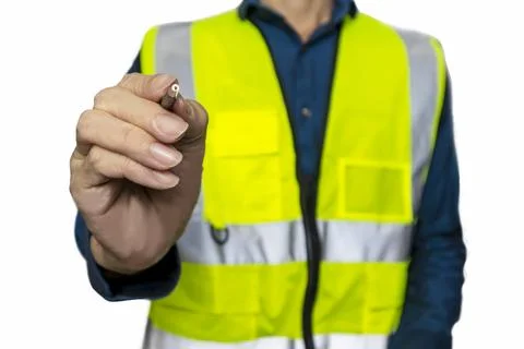 An engineer picks up a pen and points out key points, indicating their impo.. Stock Photos