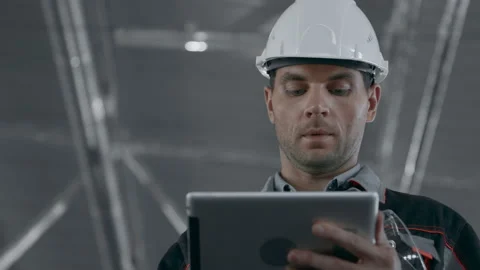 Engineer Plan of Machinery Manufacture Work. Caucasian People in Hard Hat or Saf Video stock 199475839