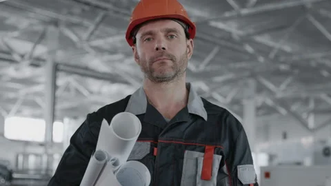 Engineer Plan of Manufacture Work. Caucasian People in Hard Hat or Safety Wear. Stock Footage 199475787