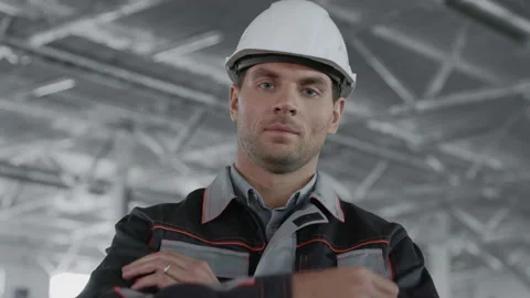 Engineer Plan of Manufacture Work. Caucasian People in Safety Hard Hat or Workwe Stock Footage 199476071