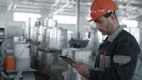 Engineer Plan of Manufacture Work. Caucasian People in Hard Hat or Safety Clothe Stock Footage 199476107