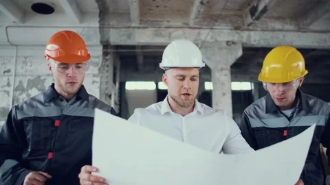 Engineer Plan of Manufacture Work. Confident Contractor or Inspection Technician Stock Footage 130777070