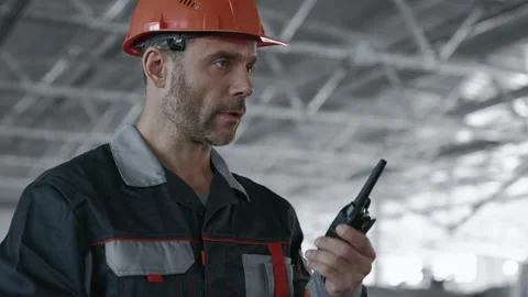 Engineer Planning Process of Machine Manufacture. Male Person in Hardhat or Prot Stock Footage 199475933
