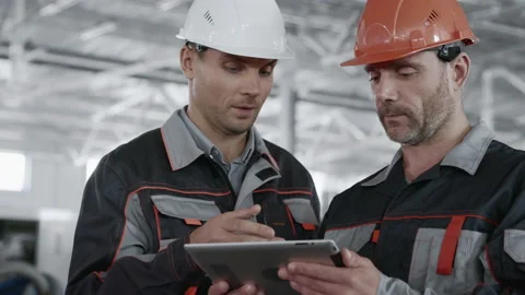 Engineer Planning Work of Heavy Machine Manufacture. Group of Male Person in Pro Stock-Footage 199476117