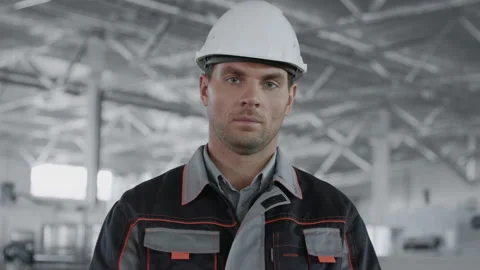 Engineer Planning Work of Machine Manufacture. Male Person in Hardhat or Protect Stock Footage 199476087