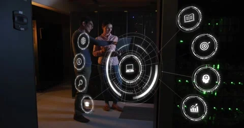 Engineer pointing at tech causing AR HUD rings lighting while peer tapping Stock Footage 332285761