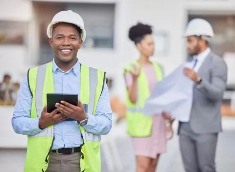 Engineer portrait, tablet and smile of black man at construction site for 写真素材