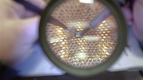 Engineer preparing new chip processor for installation on motherboard of Stock Footage 70902607