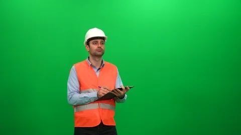 Engineer Preparing Report On A Green Screen Stock Footage 88652847